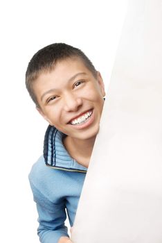 Laughing boy hiding behind the white board