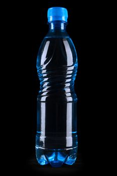 blue bottle on a black background