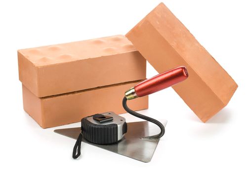 bricks tapeline and trowel
