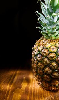 copyspace view of ananas on wooden board