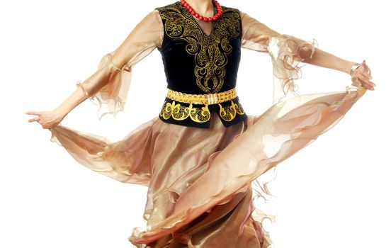 Photo of the dancing woman in traditional Uzbek costume