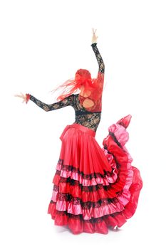 Gypsy lady dancing flamenco in traditional costume