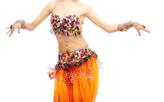 Woman body dancing belly-dance in orange costume