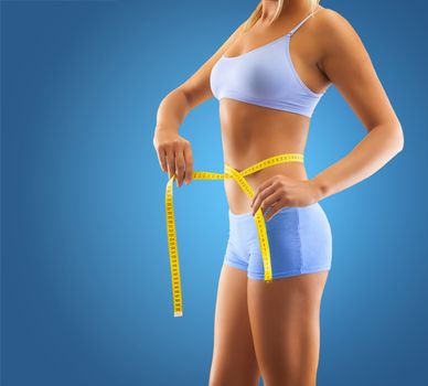 close up measuring waist