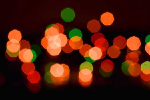 Colorful christmas lights out of focus, may be used as background