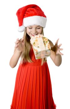 Portrait of happy little girl with gift box over white background