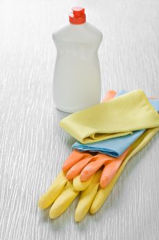 rags gloves and bottle