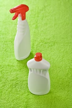 detergents on green background