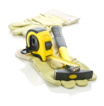 tapeline and hammer on gloves