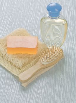 bottle hairbrush soap and bast