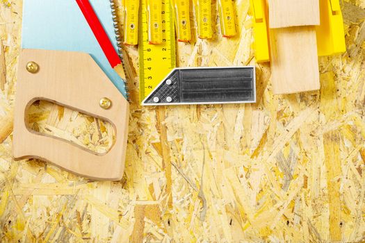 carpentry tool set on plywood board