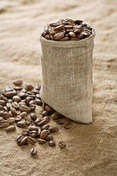 coffee grains in bag on sacking