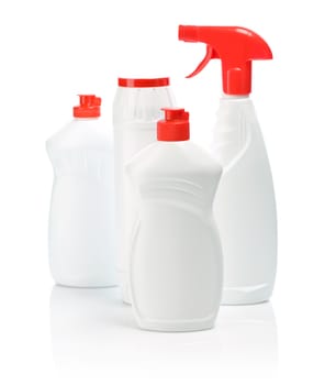 four isolated kitchen bottles