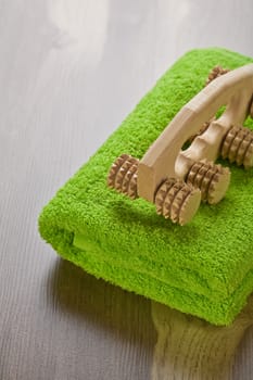 massager on green towel