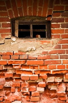 old window in a old brick wall