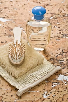 set of bath accessories on cork wood