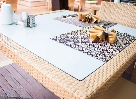 Oriental style dining table with traditional napkins