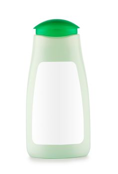 green bottle of shampoo isolated