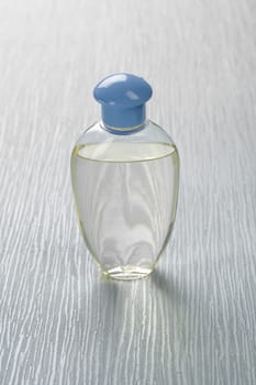 one bottle on blue background