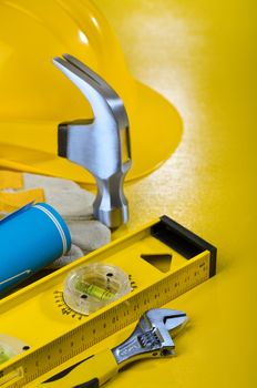 repairing tools on yellow background