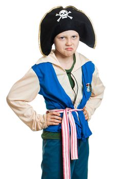 A boy pretending to be a grumpy pirate. Isolated on white.