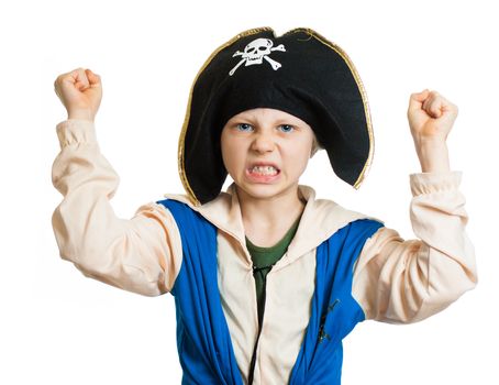 A boy dressed up as a pirate pretending to be angry and dangerous. Isolated on white.