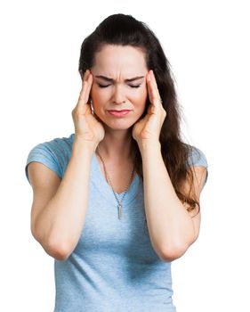 Close-up of a woman suffering from head ache. Isolated on white.