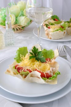 Chicken with tomatoes and cheese in a basket made ​​of dough "phyllo"