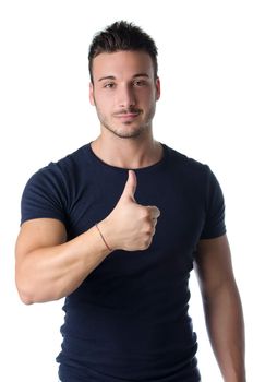 Attractive and muscular young man with thumb up doing OK sign, isolated on white