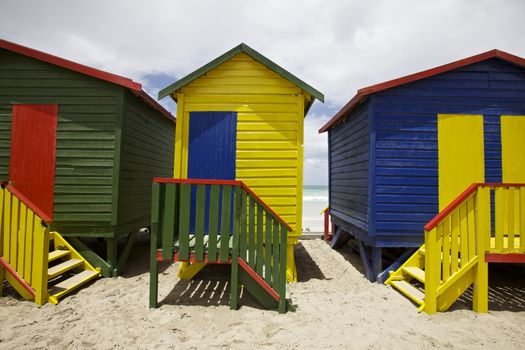 Bright painted painted beach huts, Cape Town
