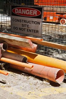 Construction Sign and Workers in Distance