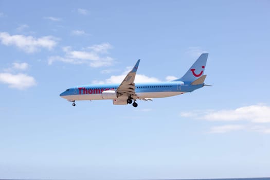 Arrecife, Spain, Mars 24.2013: Thomson one Boeing 737-800 is coming in for landing at the Airport on Lanzarote