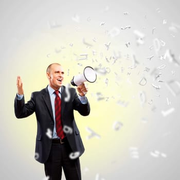 Image of angry businessman screaming in megaphone