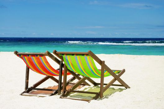 Beach chair with sea and sky background
