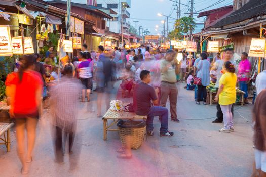 SUKHOTHAI, THAILAND - MAY 4 : Unidentified tourists are shopping and eating at Rim Yom 2437  market on May 4, 2013 in Sukhothai, Thailand.