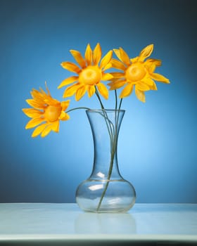 A bouquet of flowers against a colorful flowers.