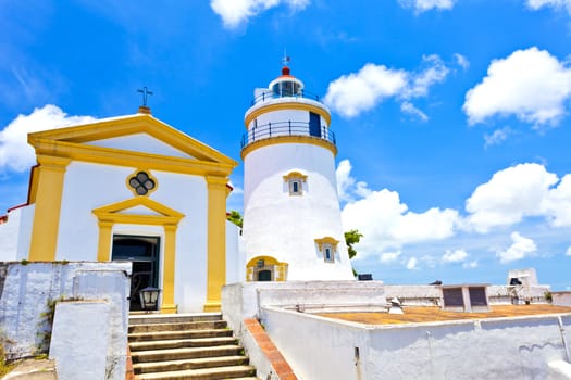 Light house and church in Macau, China.