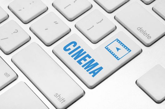 Business concept: Cinema key on the computer keyboard