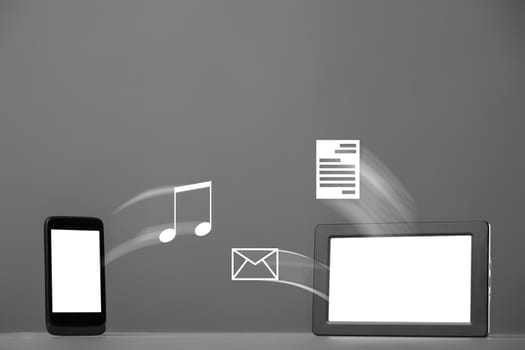 Smartphone and tablet computer on a gray background. Synchronization concept.