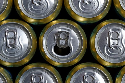 Much of drinking cans close up, one is open