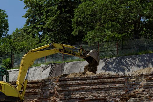 the excavator working on a construction site