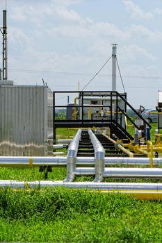 industrial pipes at an oil well