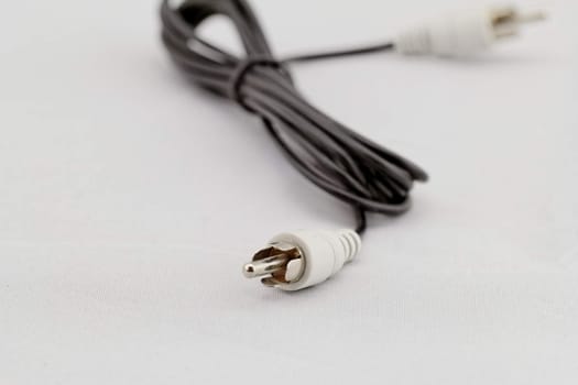 only white audio RCA cable on a white background (right)