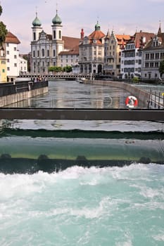 The historic picturesque centre of Lucerne, Switzerland on the banks of the Lucerne lake seen from Geissmattbrucke