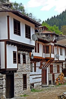 Old houses from the XVI century in the historic village of Shiroka Laka in the Eastern Rodopi mountains in Bulgaria
