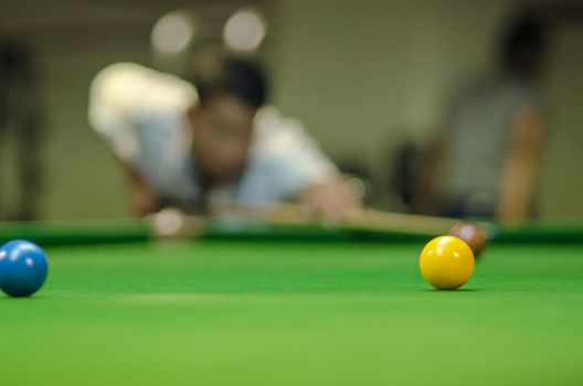 a man playing snooker game