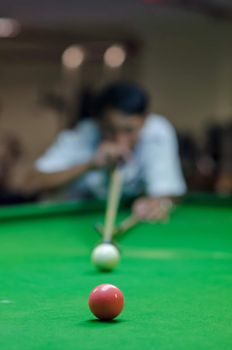 a man playing snooker game