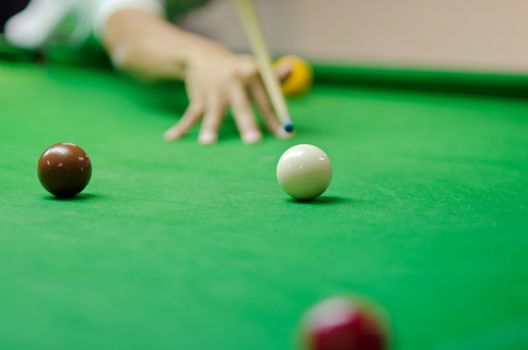 a man playing snooker game