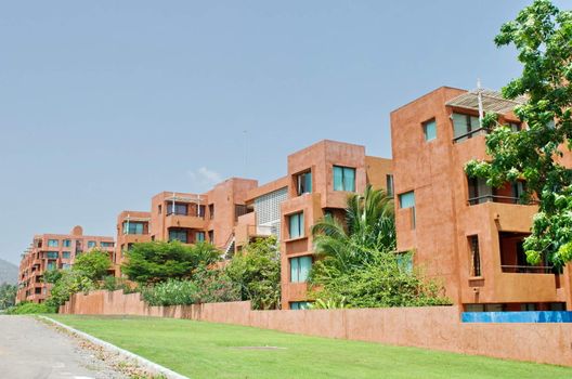 condominium buildings under the blue sky