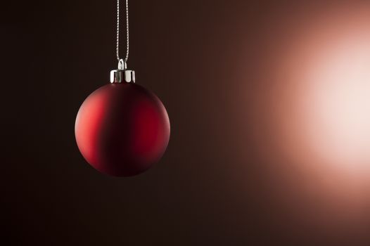 Christmas Bauble in simple color setting and side lighting 